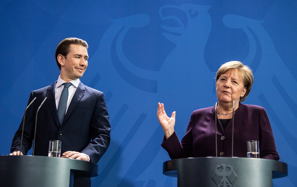 Merkel méltányos és igazságos elosztást sürget